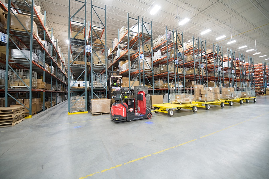 20230630-SMC-Noblesville-IN-Case-Study-Raymond-core-tow-tractor-automated-warehouse-vehicle-agv-racking-2