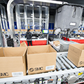 20230630-SMC-Noblesville-IN-boxes-roller-conveyor-autostore-goods-to-person-picking-stations-thumb