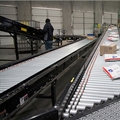 usps-parcels-on-roller-conveyor
