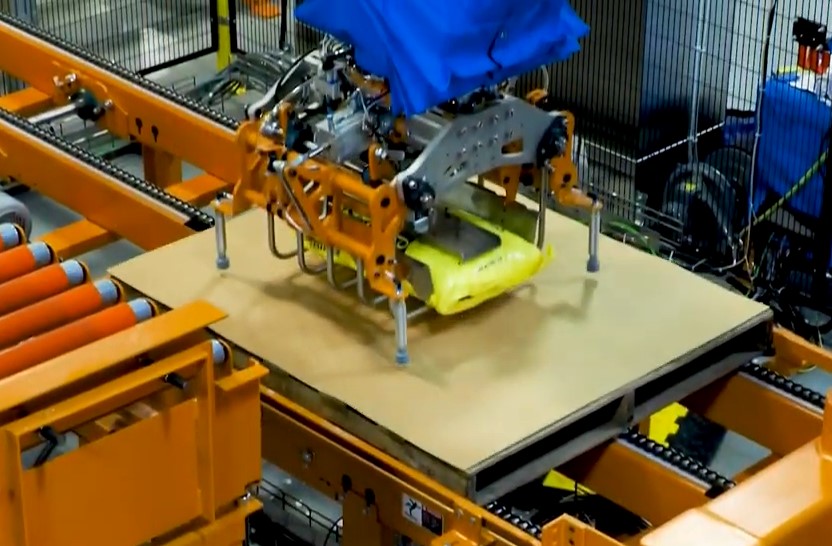 Industrial robotic slip sheet handling for palletizing