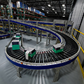 knipper_case_study_order_fulfillment_boxes_on_conveyor_curve-thumb